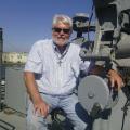 Me on a deck gun of a troop ship.