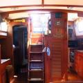 Companionway, glimpse of galley, aft head and salon.