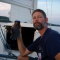 sailing buddy, J.D. shows off the new five finger coozie